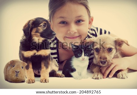 child and puppy and kitten
