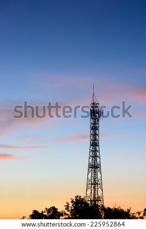 Silhouette of high communication antenna in sunset time in morning and evening time