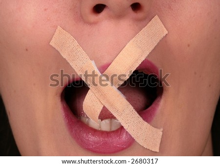 Breaking The Silence Censored woman with tape on the mouth is trying to rip it!