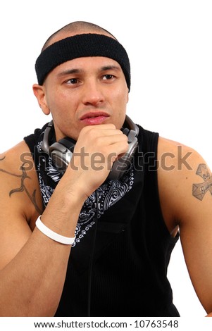 stock photo Dj With Tattoos A young DJ with headphones in black with a 