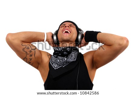 stock photo Strong And Sexy DJ A young DJ with headphones in black with 