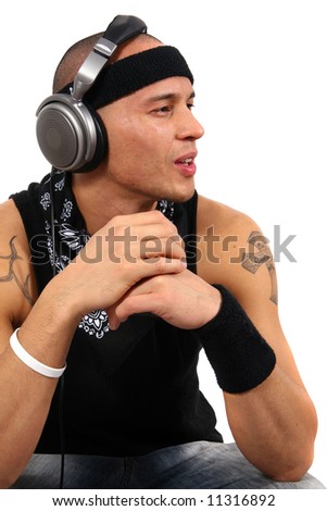 stock photo Groovin' DJ A young DJ with headphones in black with lots of