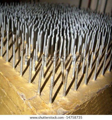 Bed Of Nails A bed of nails shot in India. The nails form a nice pattern.