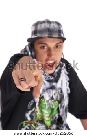 A young DJ is pointing at the camera and sreaming. The focus is on his finger! Isolated over white.
