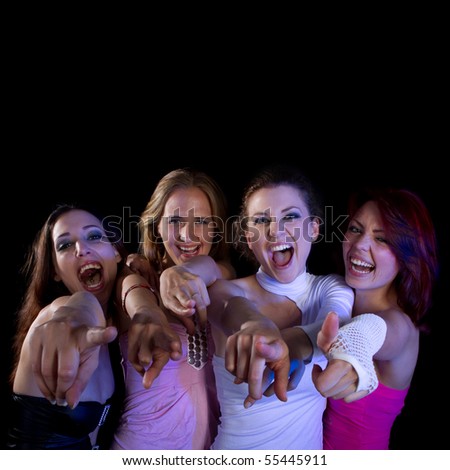 A group of four young fresh women partying. Nice lively image.