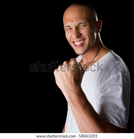stock photo Young male filipino model over a black background is gesturing stock photo Young male filipino model over a black background is gesturing