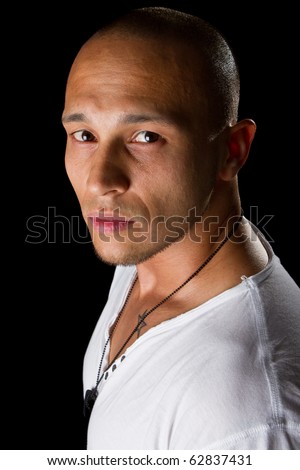 stock photo Handsome young male filipino model with white shirt over black