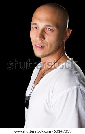 stock photo Handsome young male filipino model with white shirt over black
