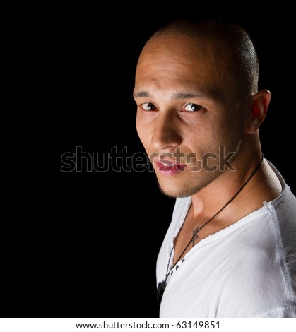 stock photo Handsome young male filipino model with white shirt over black 