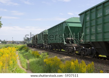 Cargo train from cars. The locomotive drags a cargo