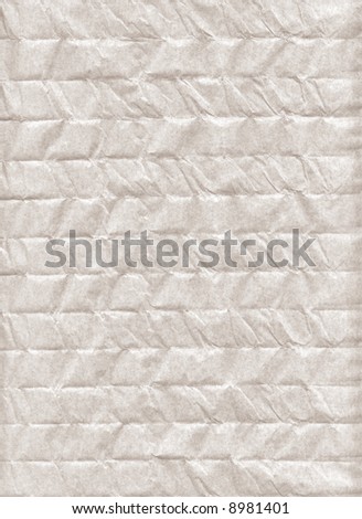 Crumpled paper. A porous paper. The thin structure fine chaotic fibers is visible