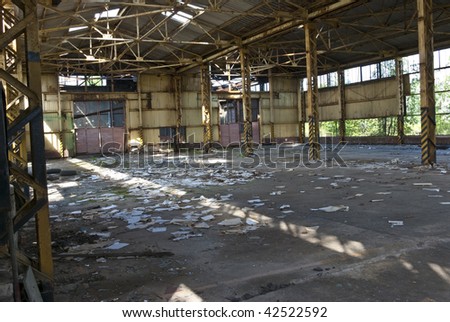 Destroyed (forgotten) a workshop of the factory.  Official papers are thrown on a floor