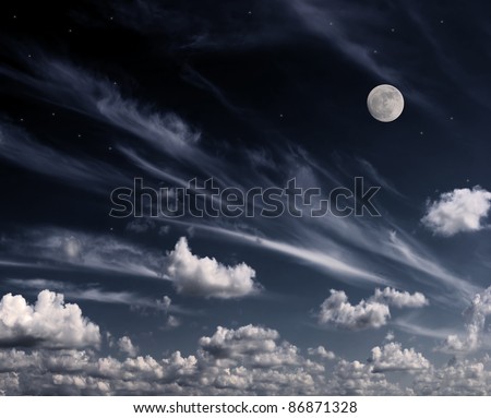 Moon in the night sky. Clouds and stars above them. Processed on a computer.