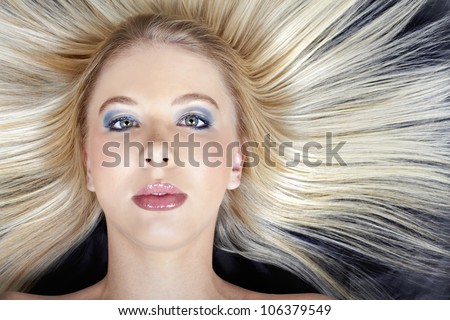Beautiful Caucasian teenage model with long straight hair combed out