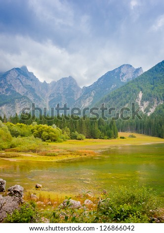 Fusine superior lake in the giulian alps, before a rainstorm