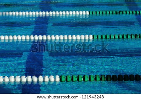 Swimming pool with buoy lane markers