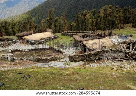 Primitive stone house Indian shepherds near the village Chopta  in the Himalayas. Uttarakhand. India