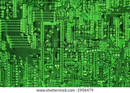 Green computer circuit details in neon light