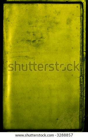 Green toned grunge dirty paper with borders
