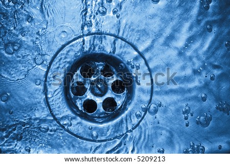 Life-giving water flows out in a hole. Image in fantastic-blue colors