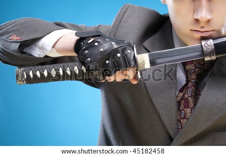 Conceptual business image. Young businessman close-up ready to start business struggle