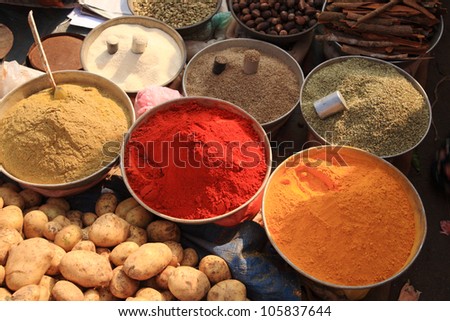 Bowls of cooking spices in Indian market Goa