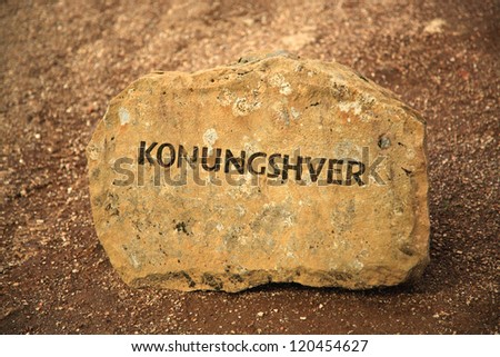 Sign carved into a rock for Konungshver geysir Iceland