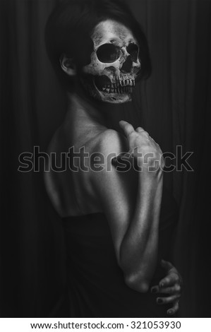 Portrait of a woman without a face, head-skull. terrible fantasy for the halloween.