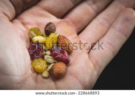 a person sharing some healthy trail mix