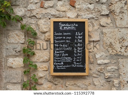 Menu board outside a French restaurant