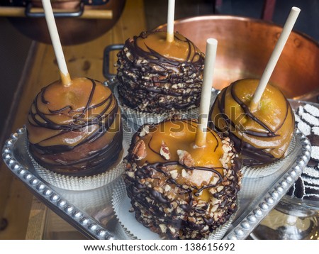 Caramel apple, taffy apple, candy apple, toffee apple, with almonds and other nuts
