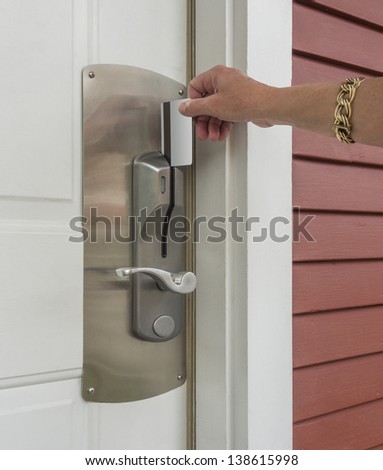 Keycard being inserted in electronic lock