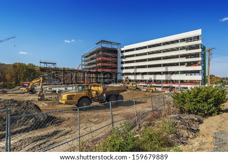 construction site for a new office or commercial building in the suburbs