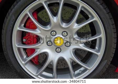 Modern wheel with low profile tires and carbon fiber brakes