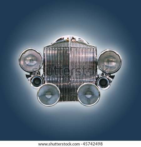 stock photo Car grill from the 30ies isolated on blue with clipping path
