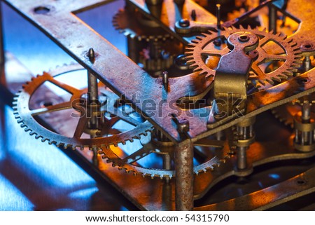 The inside of a clock with exposed gears