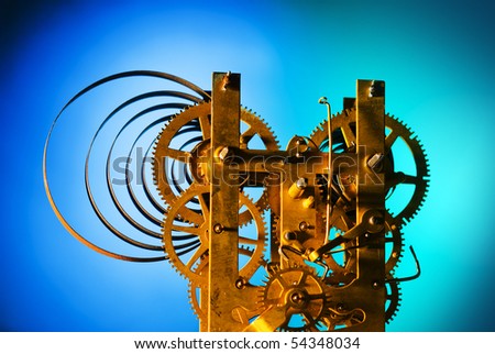 Clock interior with exposed gears of various sizes
