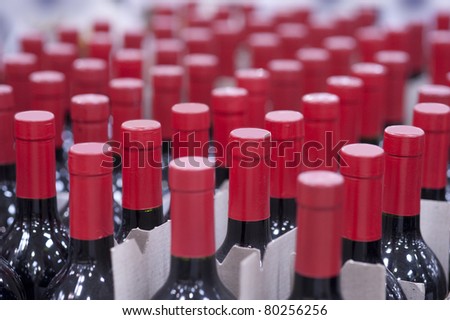 Wine bottles shot with limited depth of field on display in a liquor store