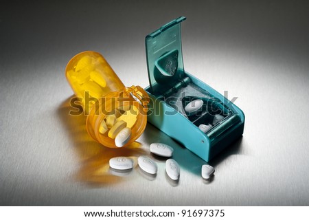 Cutting prescription pills in half to save money