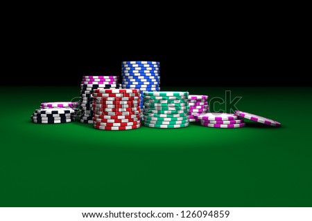 Gambling casino chips stacked on green table. Great background for poker magazines, banners, webpages, flyers, etc.