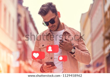 Young Adult Man Using Social Media on Smartphone - Like, Follower, Comment icons