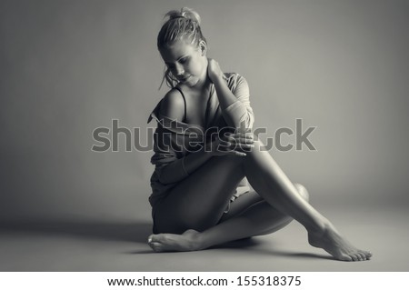 Beauty lady sitting in opened shirt