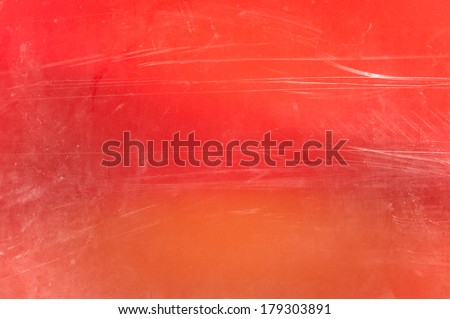 Red orange abstract scratched film background texture