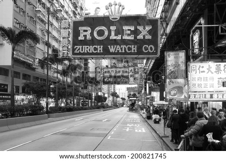 HONG KONG - JANUARY 4, 2012: B&W scene along the Nathan Road (Golden Mile), on the Kowloon side of Hong-Kong, China on January 4, 2012. China is a significant and increasing market for Swiss watches.