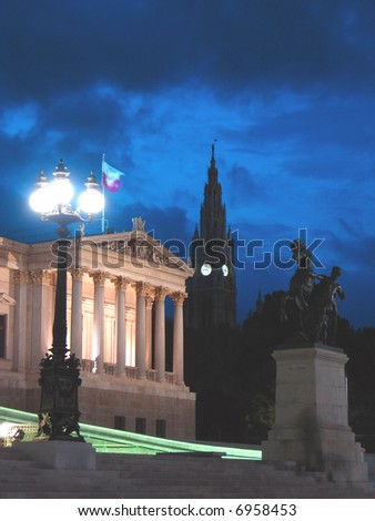 Vienna night, Austria (Austrian Parliament Rathaus's (Vienna's Town Hall) main tower silhouette)