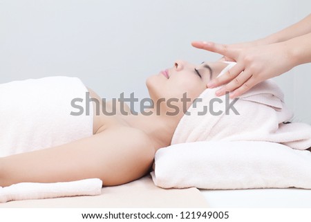 beautiful asian girl in spa on spa bed