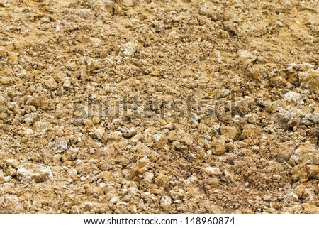 natural brown soil and pebble pattern on ground