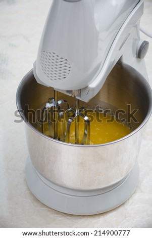 mixing butter with dough mixer