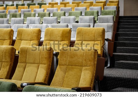 vacant theater chair in  hall