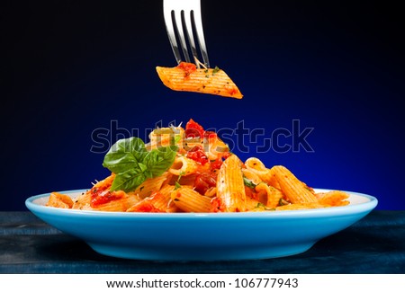 Pasta with tomato sauce and parmesan